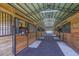Spacious barn stalls with horses at 37600 Largo Ln, Dade City, FL 33523