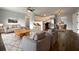 Spacious open-concept living room and kitchen with hardwood floors, new appliances and lots of natural light at 4011 Mesa Ave, Sarasota, FL 34233