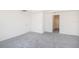 Cozy bedroom with plush carpeting and easy access to closet and hallway at 5637 Ocarina Rd, North Port, FL 34291