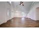 Living area with high ceilings, hardwood floors, and an open floor plan at 34392 Broken Stone St, Webster, FL 33597