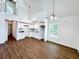Modern kitchen with white cabinets, subway tile backsplash, and a neutral color scheme at 34392 Broken Stone St, Webster, FL 33597