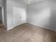Empty carpeted bedroom with a spacious closet and neutral paint at 33083 Windelstraw Dr, Wesley Chapel, FL 33545