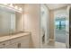 Bathroom with vanity, toilet, and access to another room at 4915 Carova Way, Lakewood Ranch, FL 34211