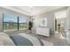Bright bedroom with large window and dresser at 4915 Carova Way, Lakewood Ranch, FL 34211