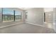 Bright and spacious bedroom with large windows and carpeting at 4915 Carova Way, Lakewood Ranch, FL 34211