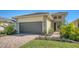 Attractive single-story house with a two-car garage and well-manicured lawn at 4915 Carova Way, Lakewood Ranch, FL 34211