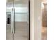 Stainless steel refrigerator in a contemporary kitchen setting at 4915 Carova Way, Lakewood Ranch, FL 34211
