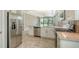Modern kitchen with stainless steel appliances and granite countertops at 4915 Carova Way, Lakewood Ranch, FL 34211