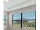 Open living area with large windows and blinds, offering natural light at 4915 Carova Way, Lakewood Ranch, FL 34211