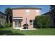 A cozy backyard with a patio, lush lawn, and mature landscaping, perfect for outdoor enjoyment at 11774 Tempest Harbor Loop, Venice, FL 34292