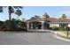 Elegant clubhouse with stone accents, offering residents a luxurious space for gatherings and events at 11774 Tempest Harbor Loop, Venice, FL 34292