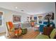 Open living area with hardwood floors, eclectic decor, and natural light at 117 88Th Ave, Treasure Island, FL 33706