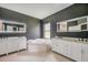 Double vanity bathroom with soaking tub and walk-in shower at 8235 Bird Whistle Ln, Land O Lakes, FL 34637