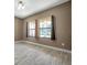 Bright dining room with large windows and tile flooring at 8235 Bird Whistle Ln, Land O Lakes, FL 34637