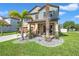Two-story house with landscaped front yard at 8235 Bird Whistle Ln, Land O Lakes, FL 34637