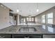 Kitchen with stainless steel sink and view of living room at 8235 Bird Whistle Ln, Land O Lakes, FL 34637