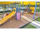 Playground with slides, climbing wall, and shaded area at 8235 Bird Whistle Ln, Land O Lakes, FL 34637