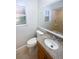 Bathroom featuring a granite vanity, a large mirror, and a walk in shower at 3184 Wessex Way, Clearwater, FL 33761