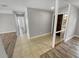 Welcoming entryway boasts neutral walls, ceramic tile, and modern wood-look flooring, creating a stylish first impression at 3184 Wessex Way, Clearwater, FL 33761