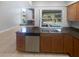 Kitchen featuring stainless steel appliances, sink and a view to the pool at 3184 Wessex Way, Clearwater, FL 33761
