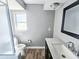 Bathroom with toilet, sink, and shower/tub combo at 6298 40Th N Ave, St Petersburg, FL 33709