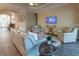 Spacious living room featuring light colored furniture and wood floors at 13219 Palermo Dr, Lakewood Ranch, FL 34211