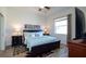 Comfortable bedroom with a king-size bed and window at 443 Noble Faire Dr, Sun City Center, FL 33573