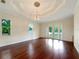 Bright dining room with hardwood floors and access to the backyard at 2513 Andrea Lynn Dr, Lutz, FL 33549