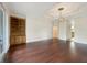 Large main bedroom with hardwood floors and access to a private bathroom at 2513 Andrea Lynn Dr, Lutz, FL 33549