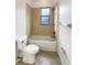 Clean bathroom with a bathtub and tile flooring at 2513 Andrea Lynn Dr, Lutz, FL 33549