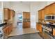 Well-equipped kitchen with ample cabinetry and granite countertops at 2513 Andrea Lynn Dr, Lutz, FL 33549