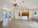 Open-concept living area with tile flooring and high ceilings at 2513 Andrea Lynn Dr, Lutz, FL 33549