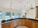 Spacious kitchen with granite countertops and modern appliances at 2513 Andrea Lynn Dr, Lutz, FL 33549