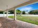 Spacious covered patio overlooking a fenced backyard at 2513 Andrea Lynn Dr, Lutz, FL 33549