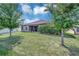 Large backyard, perfect for outdoor entertaining and relaxation at 6722 Wild Elm Ct, Wesley Chapel, FL 33545