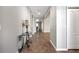 Bright entryway with tile flooring and an accent table at 6722 Wild Elm Ct, Wesley Chapel, FL 33545