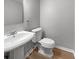 A clean half bathroom features modern fixtures and updated styling at 3421 S Carter St # C, Tampa, FL 33629