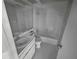 Bright bathroom with a sink, toilet, and a tiled bathtub and shower combination at 3421 S Carter St # C, Tampa, FL 33629