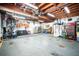 Spacious garage with exposed wood beams, offering ample storage and workspace at 3240 San Mateo St, Clearwater, FL 33759