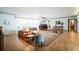 Spacious living room with lots of natural light, neutral paint, and warm accents at 3240 San Mateo St, Clearwater, FL 33759
