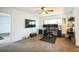 Spacious home office features a desk with dual monitors and a mounted TV at 3240 San Mateo St, Clearwater, FL 33759