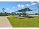 Community playground with shaded play area at 12120 Barnsley Reserve Pl, Gibsonton, FL 33534