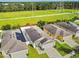 Aerial view of houses with solar panels at 12120 Barnsley Reserve Pl, Gibsonton, FL 33534