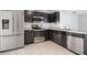 Modern kitchen with stainless steel appliances at 12120 Barnsley Reserve Pl, Gibsonton, FL 33534