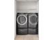Laundry closet with a stackable washer and dryer at 12120 Barnsley Reserve Pl, Gibsonton, FL 33534