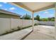 Covered patio and fenced backyard at 12120 Barnsley Reserve Pl, Gibsonton, FL 33534