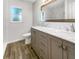 Updated bathroom with double vanity and marble countertops at 1019 Deer Run, Venice, FL 34293