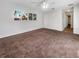 Bright bedroom with carpet and double door closet at 1019 Deer Run, Venice, FL 34293