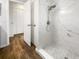 Updated bathroom with a large walk-in shower and marble tile at 1019 Deer Run, Venice, FL 34293