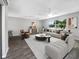 Bright living room with stylish furniture and hardwood floors at 1019 Deer Run, Venice, FL 34293
